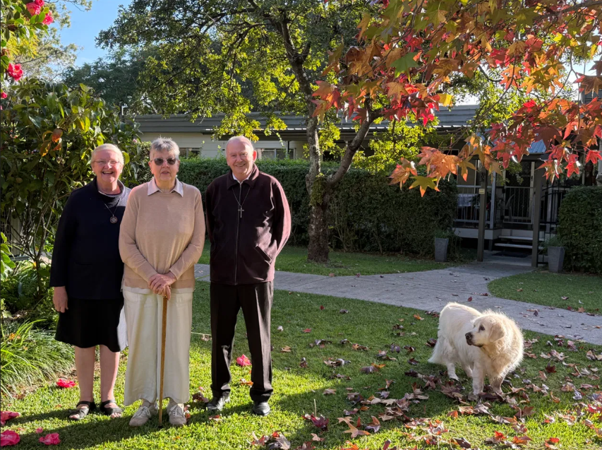 abbey-community-members-residential-gardens.jpg Abbey Community members standing in the residential gardens of the Abbey