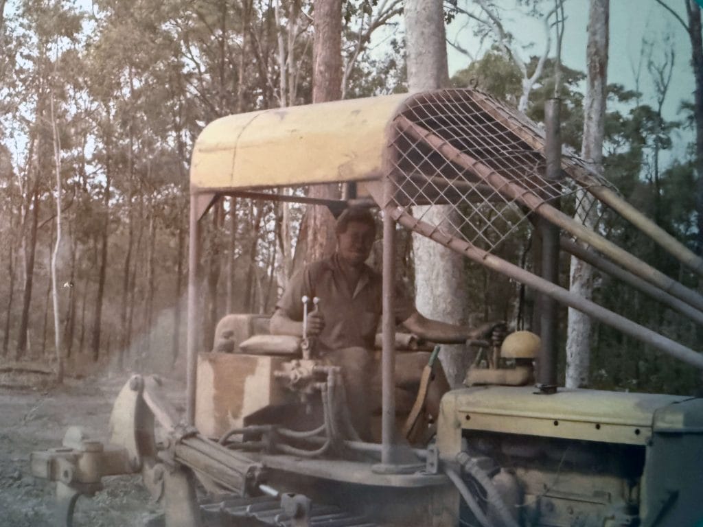 St Michael's College Bulldozer Preparing Campus Site Community members constructing the first St Michael’s College campus buildings at Caboolture in the 1980s